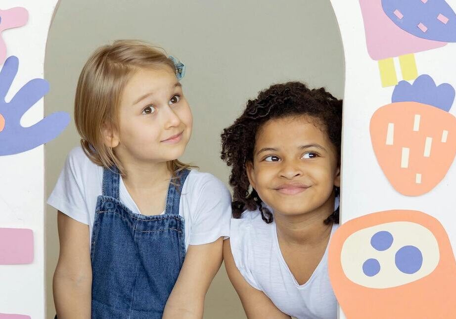 girls playing and smiling
